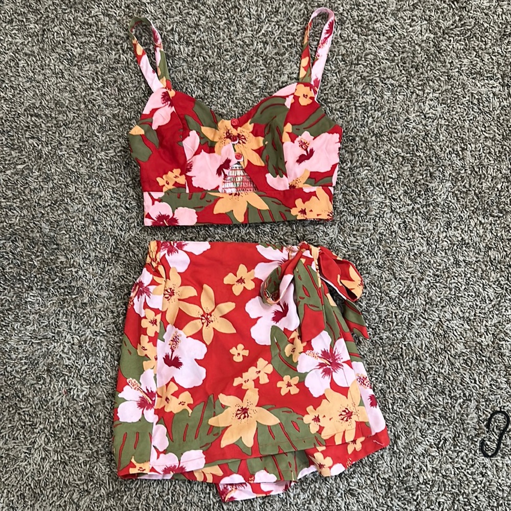 NWOT Floral two-piece set with a short in red with pink and orange flowers.